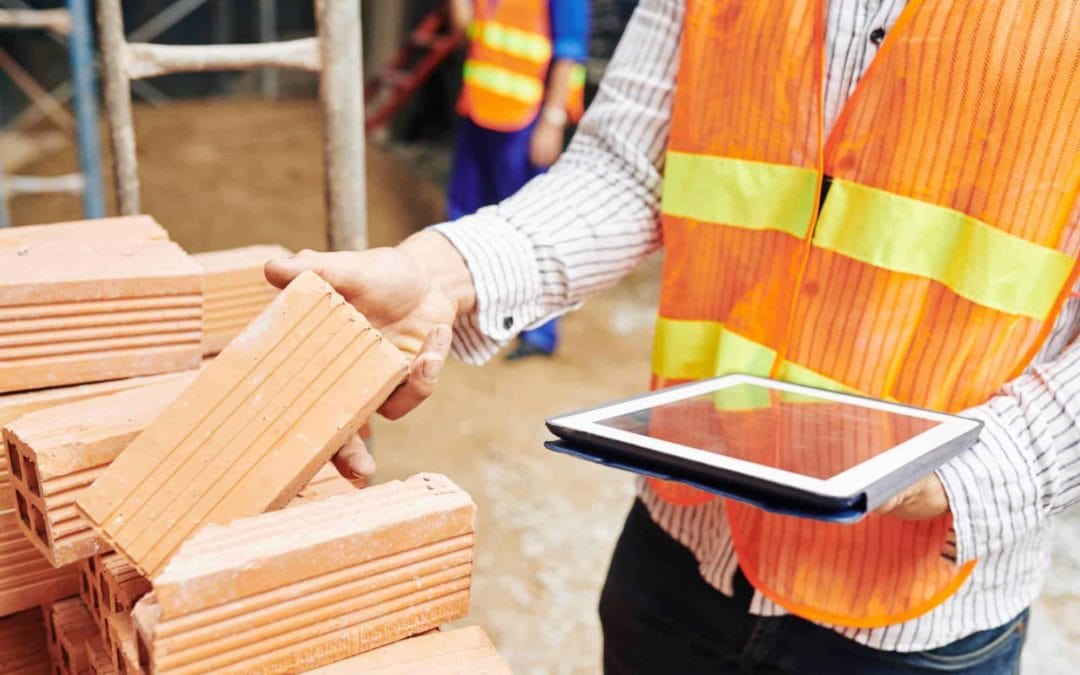 How does Habitat source building materials?