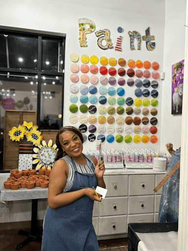 Kynedii Kimble at a pottery painting studio in Dallas